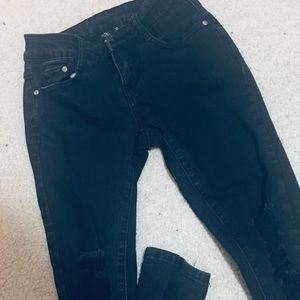 High waisted black ripped jeans